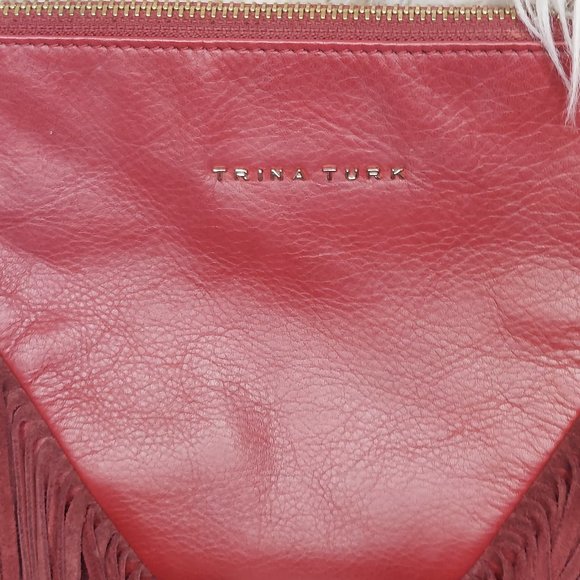 Deep Red Trina Turk Fringe bag with wristlet. Like New. Medium size. - Picture 4 of 5